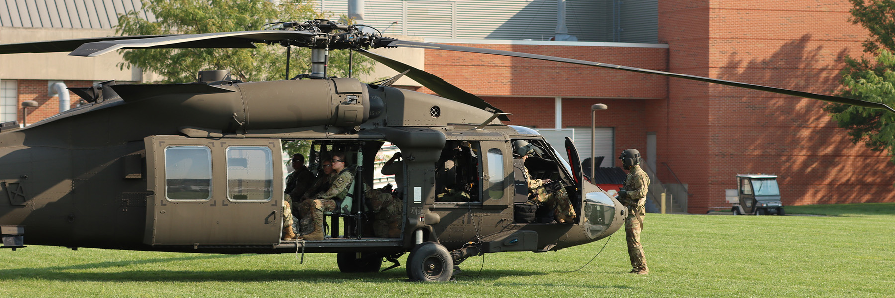 ROTC students abroad a helicopter